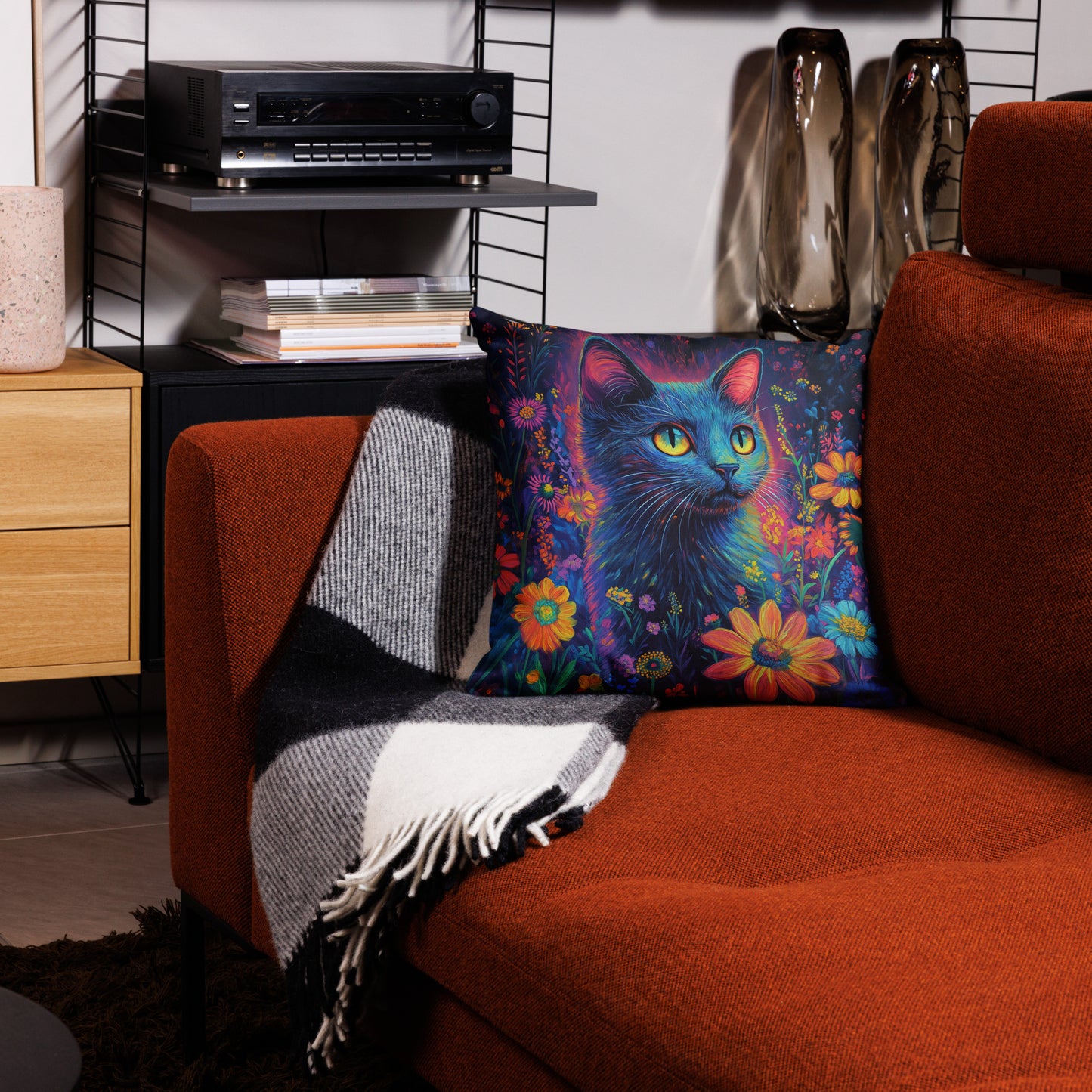 Bright neon cat throw pillow styled in boho living room décor