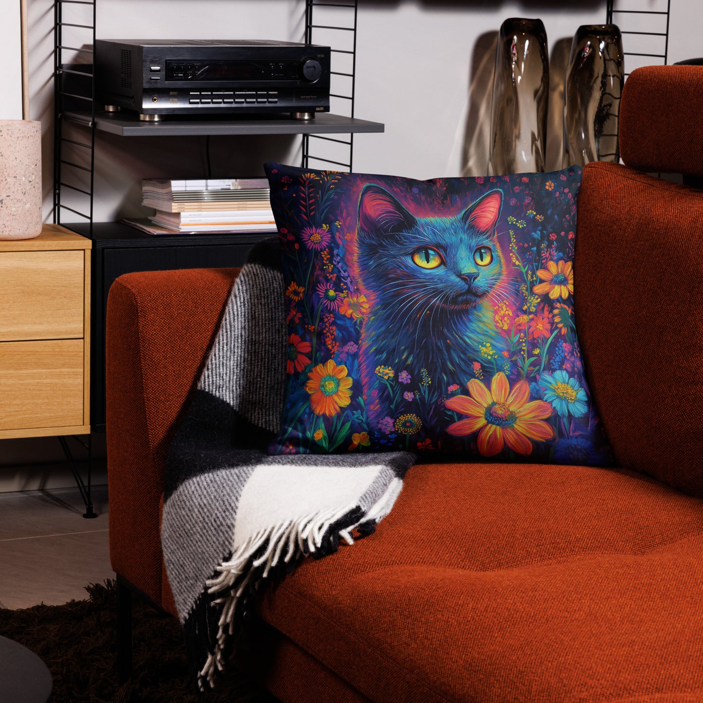Bright neon cat throw pillow styled in boho living room décor