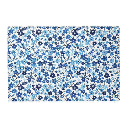 Blue watercolor floral area rug with soft botanical flower design